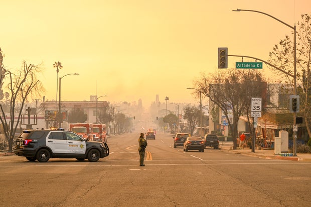 Law enforcement takes security measures during the Eaton Fire in the Altadena community of Los Angeles County, California, Jan. 9, 2025. 