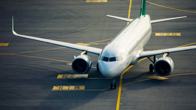 Airplane taxiing at airport 