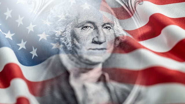 Composition of the American Flag with a portrait of George Washington on a one-dollar bill. Concept of money, independence, election, culture or American currency. 