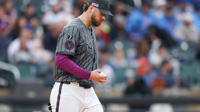 Tylor Megill #38 of the New York Mets reacts after giving up a solo home run during the fourth inning of the game against the Tampa Bay Rays at Citi Field on June 14, 2025 in New York City. 